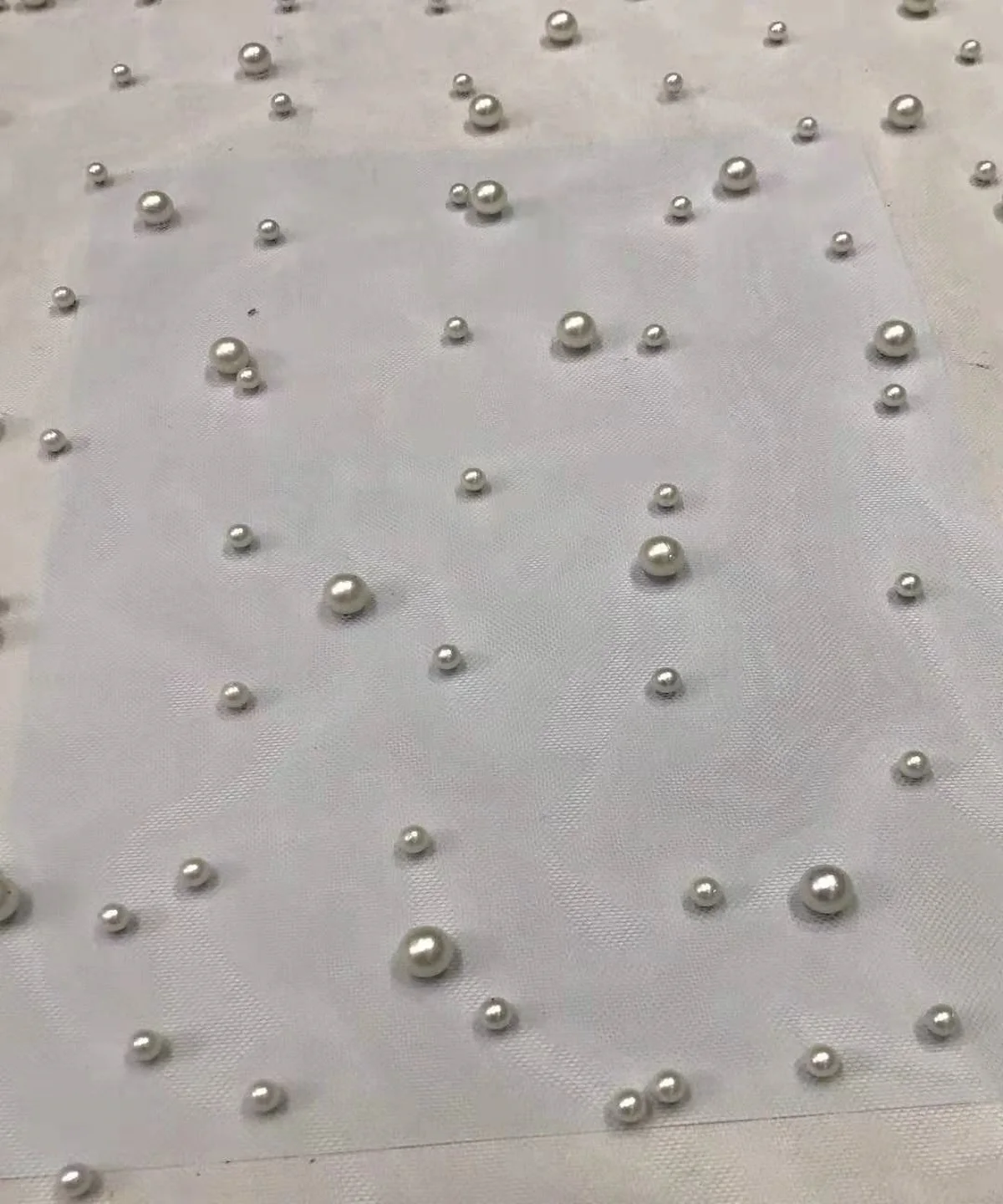 

New tulle with pearl soft hand feel for bridal dress