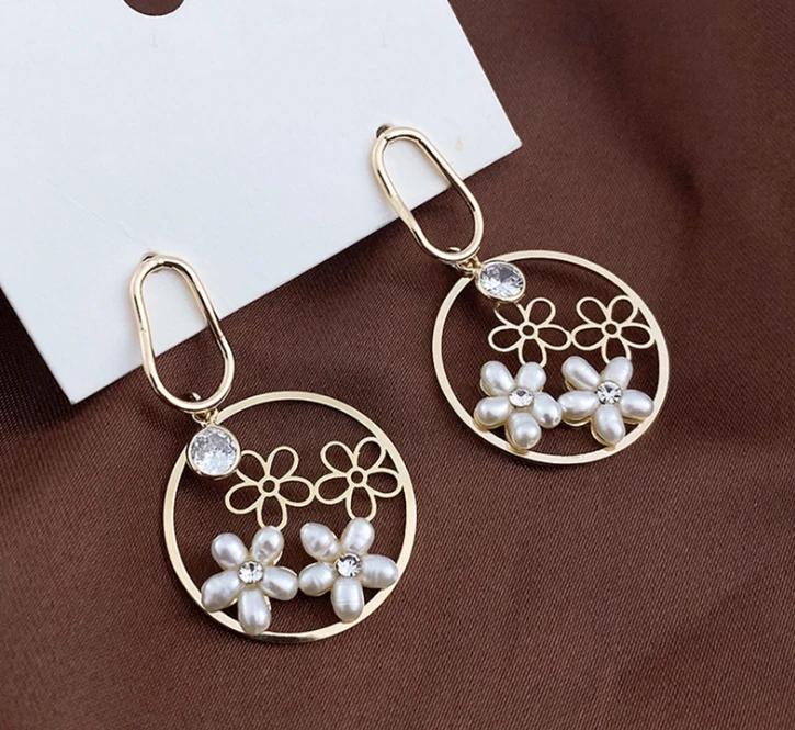 

S925 silver post earrings exaggerated flower round earrings Korean women's advanced pearl earrings