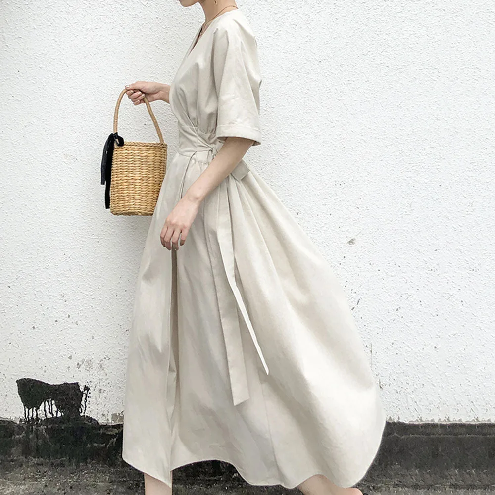 

The new fall monochrome v-neck dress korean version lace-up dress MIDI skirt, Shown