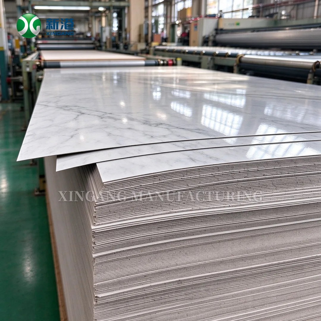 Stack of grey marble HPL laminate sheets showing gloss reflections
