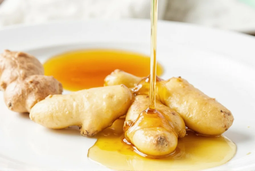 Fresh ginger root and raw honey for making natural syrup