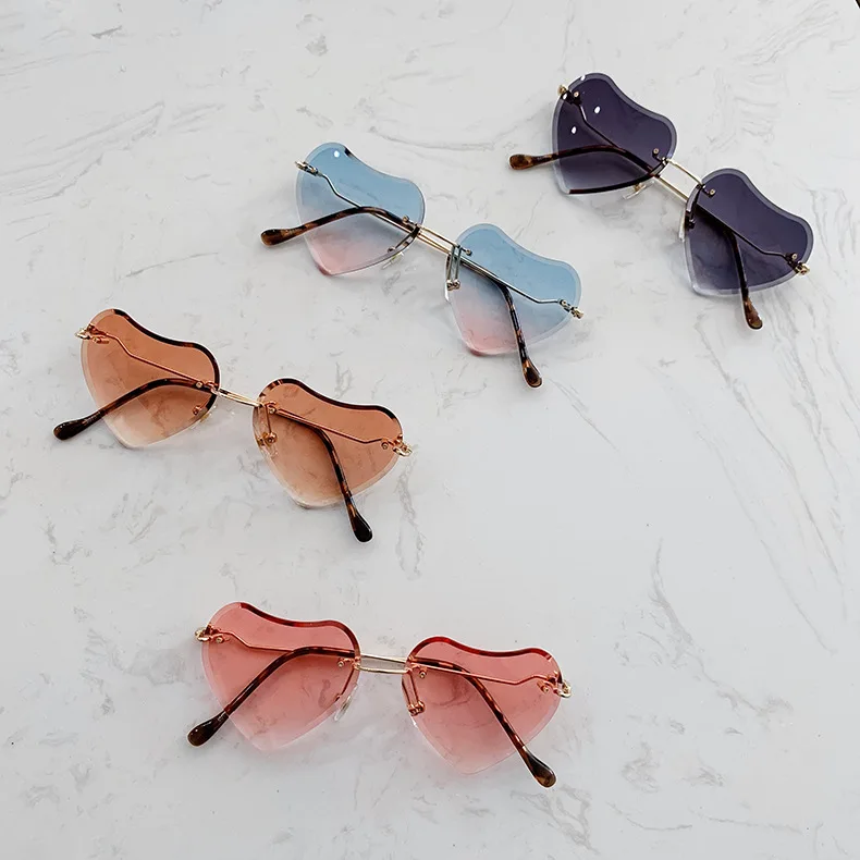 

2021 new love heart child sun glasses girls rimless baby glasses creative sunglasses, As the picture show