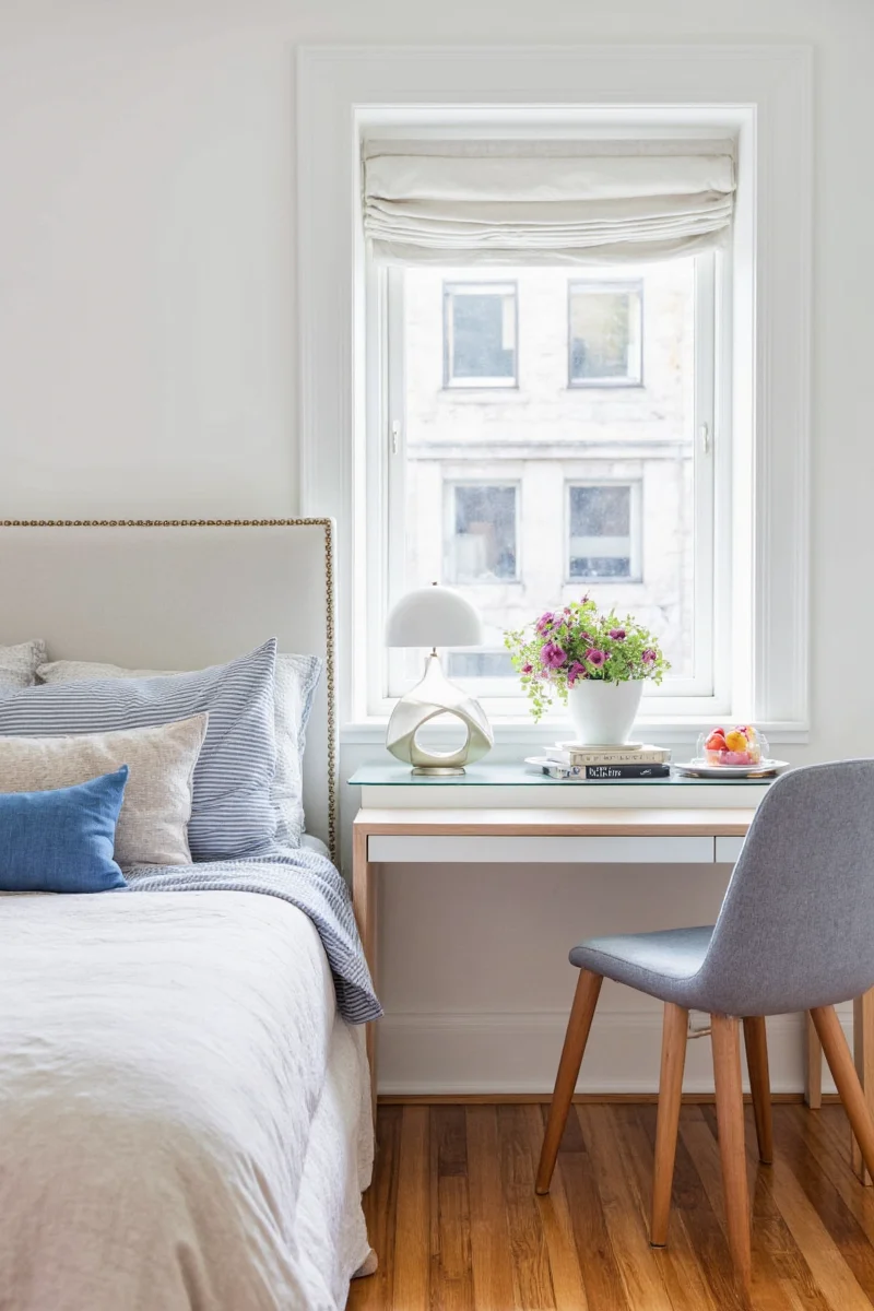 Cozy small bedroom with bunk bed and storage