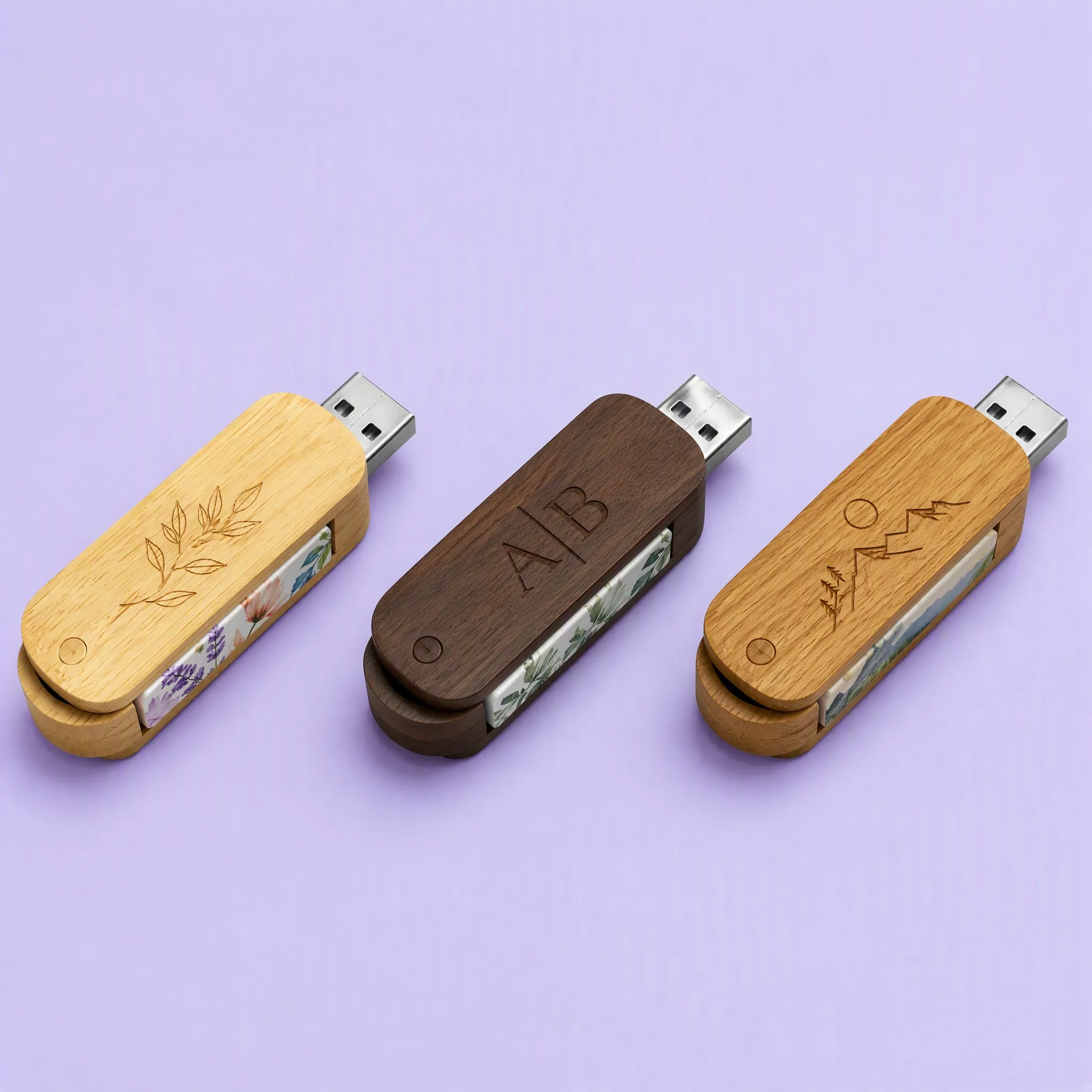 3-Wood Trio Lineup: Light Maple with Olive Branch, Dark Walnut with Monogram, and Golden Oak with Mountain Sunrise