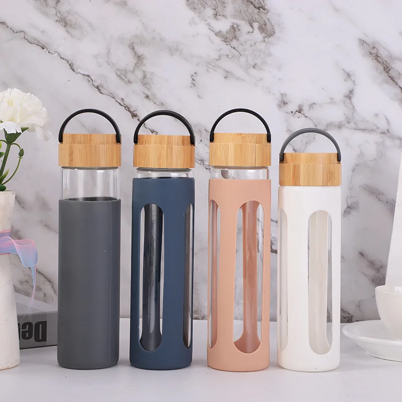 

High quality sublimation 600ml borosilicate bpa free sports reusable insulated glass water bottle with silicone sleeve/lid, Customized color