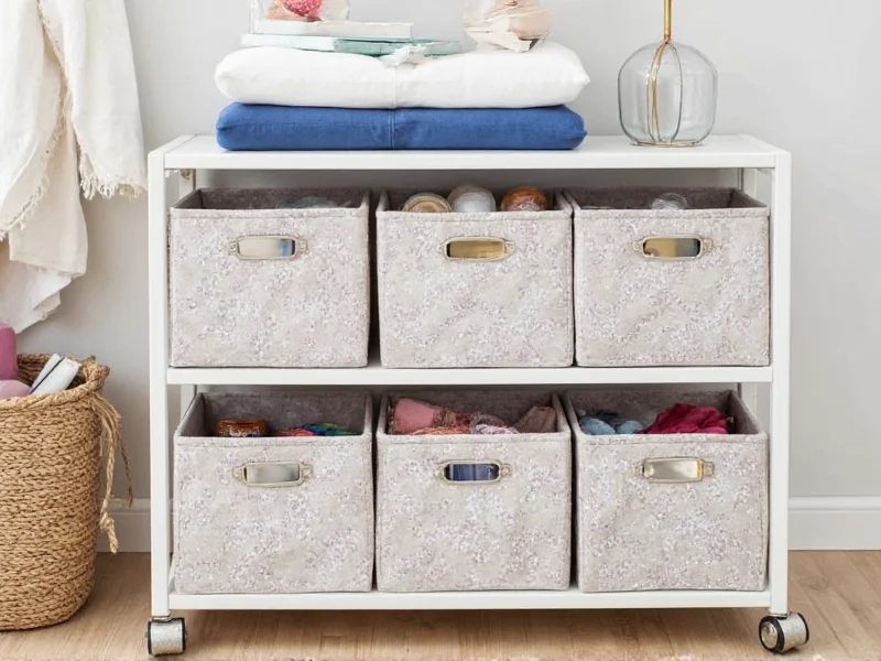 KALLAX unit with fabric bins holding craft supplies