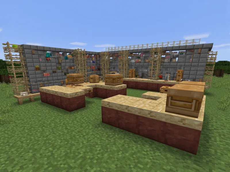Minecraft crafting station with multiple tables and storage