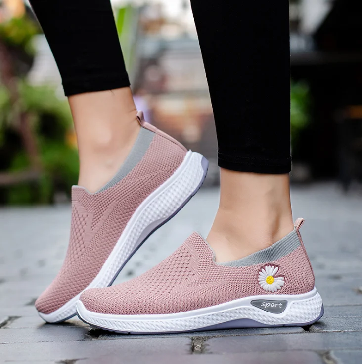 

Wholesale fly knit daisy logo women fashion sneakers big size wide topline women casual loafers shoes for women, Pink
