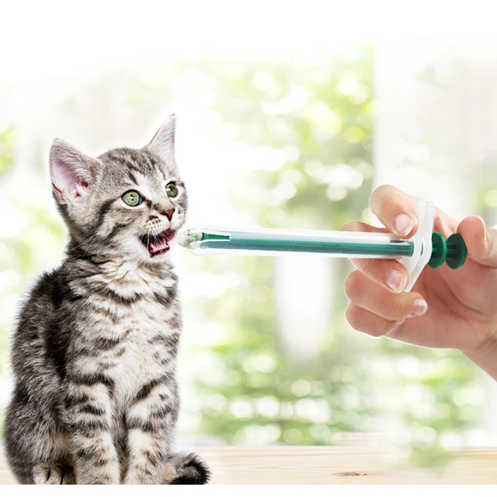 

Manufacturers wholesale Medical Control Rod Pet Medicine Feeder injector pet feeder, Green/red
