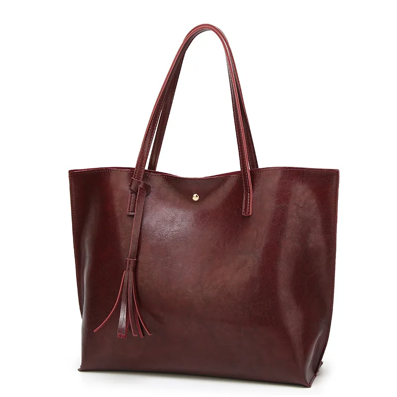 

Women Fashion Stock Wholesale Retro Embossing Leather Handbag Tote Bag with Tassel
