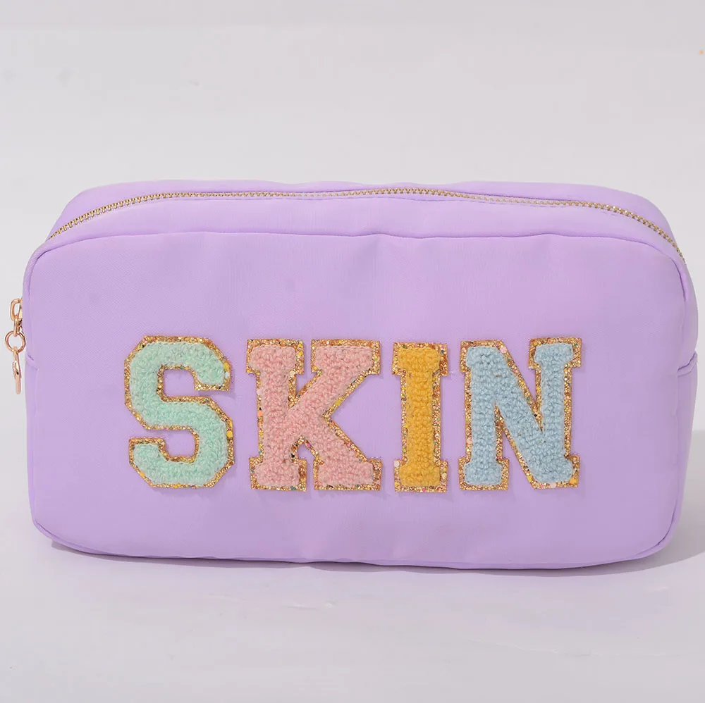 

stock New nylon cosmetic bag small MOQ Factory can customized make up bag with Chenille letter patches