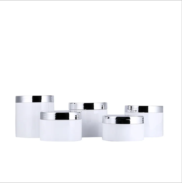 

luxury white plastic jar cream container bottle with shiny silver cap