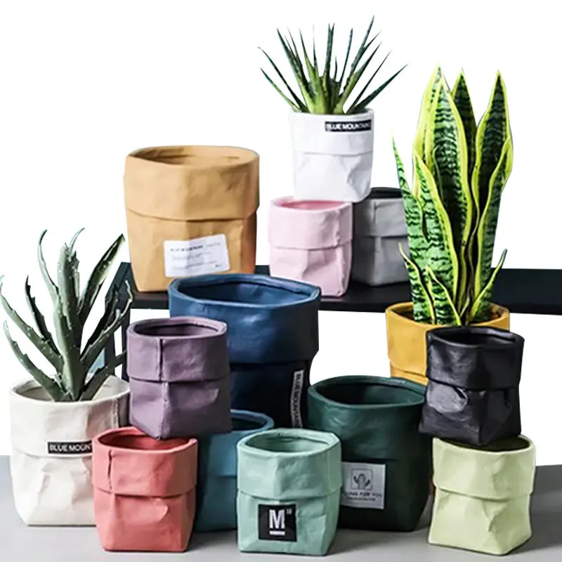 

Redeco New Arrival Art Pots For Flowers Simulation Kraft Paper Bag Design With Drainage Ceramic Planter For Garden Supplies