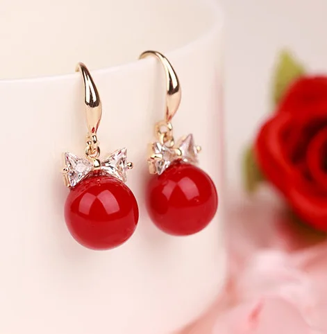 

Sweet bowknot pearl earring crystal earrings female