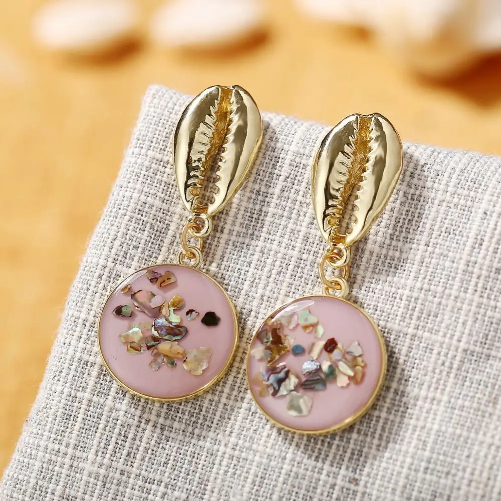 

Pearl Shell Conch Statement Earrings