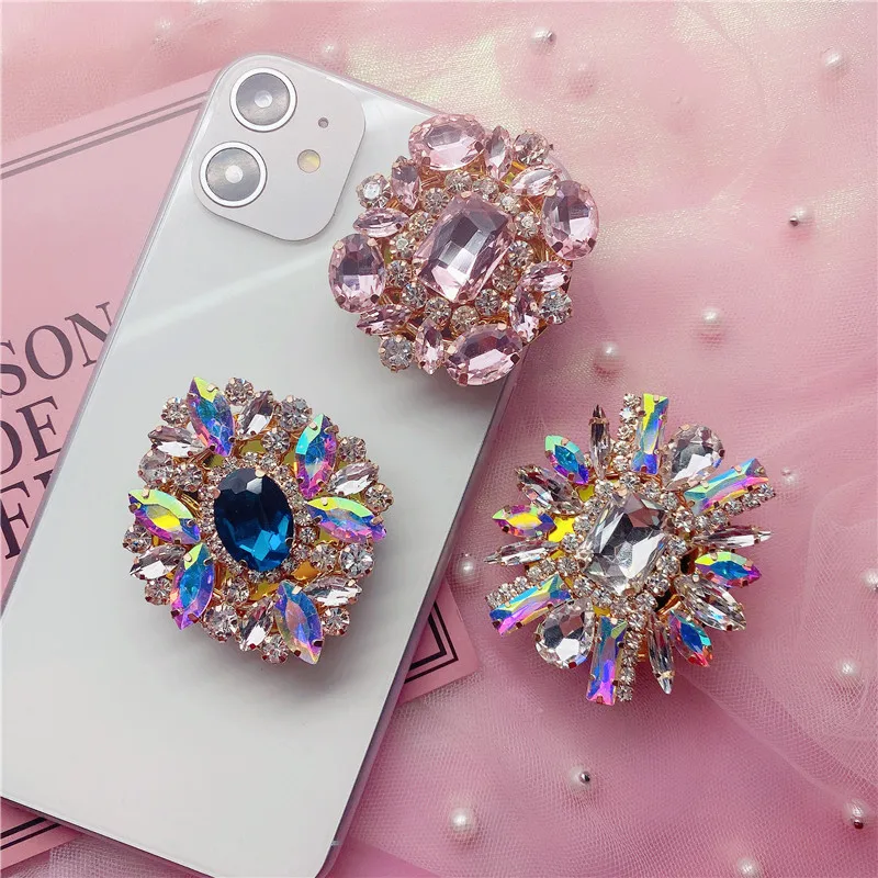 

Factory price beautiful mobile phone accessories with diamond stone expanding phone socket phone