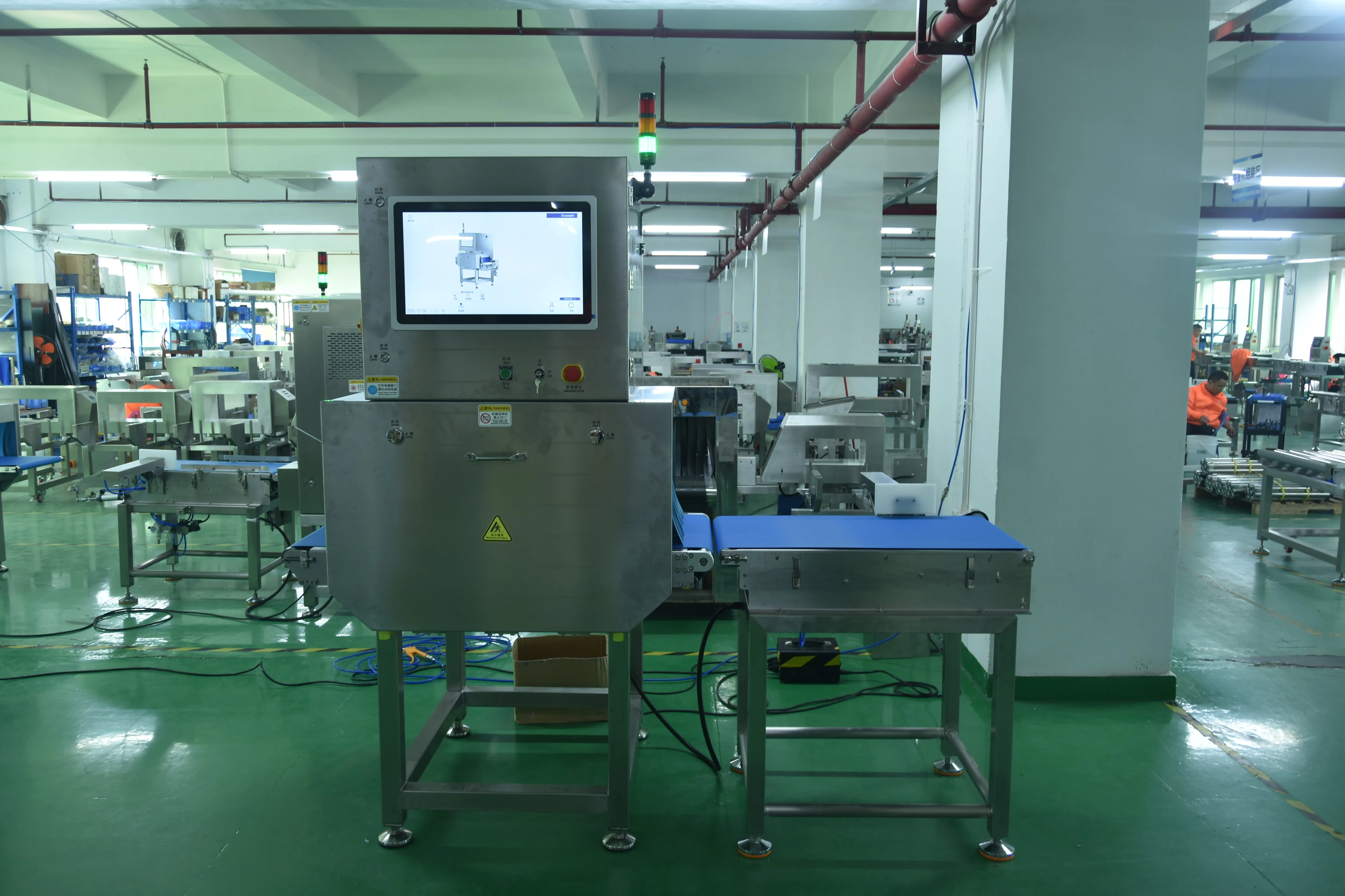 Independent outfeed conveyor beside the inspection unit