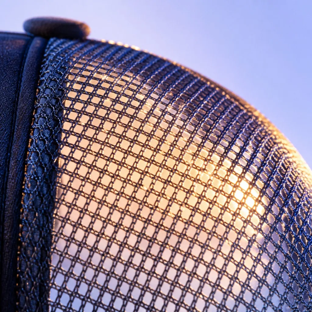 Extreme Macro Texture of Breathable Interlocking Poly Trucker Mesh Back Panels