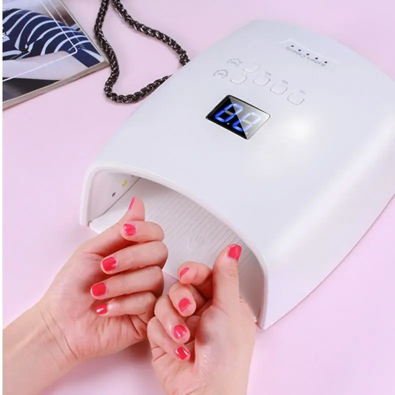 

New Arrival 48w Wireless/cordless Battery Rechargeable Nail Lamp