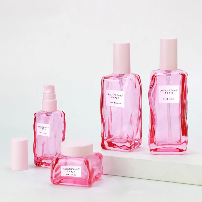 

Empty pink luxury skincare lotion bottles new cosmetic packaging glass pump bottle 100ml