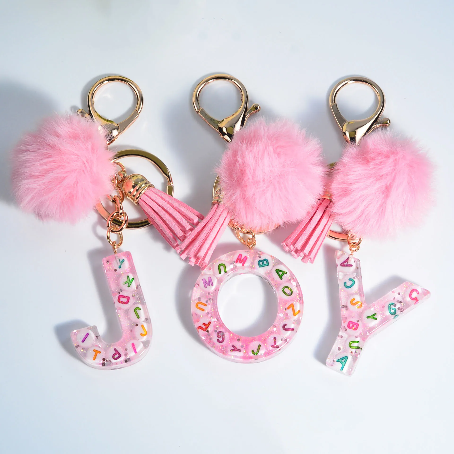 

Hot Selling Hairball Tassel Keychain Mixed Acrylic Letters Keychain A-Z Epoxy Resin Keychain