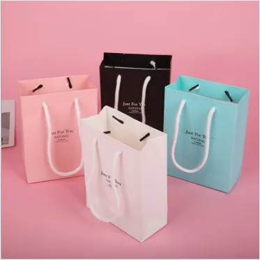 

Factory price custom recycled paper portable packaging carry bags for gift jewelries, Customized colors