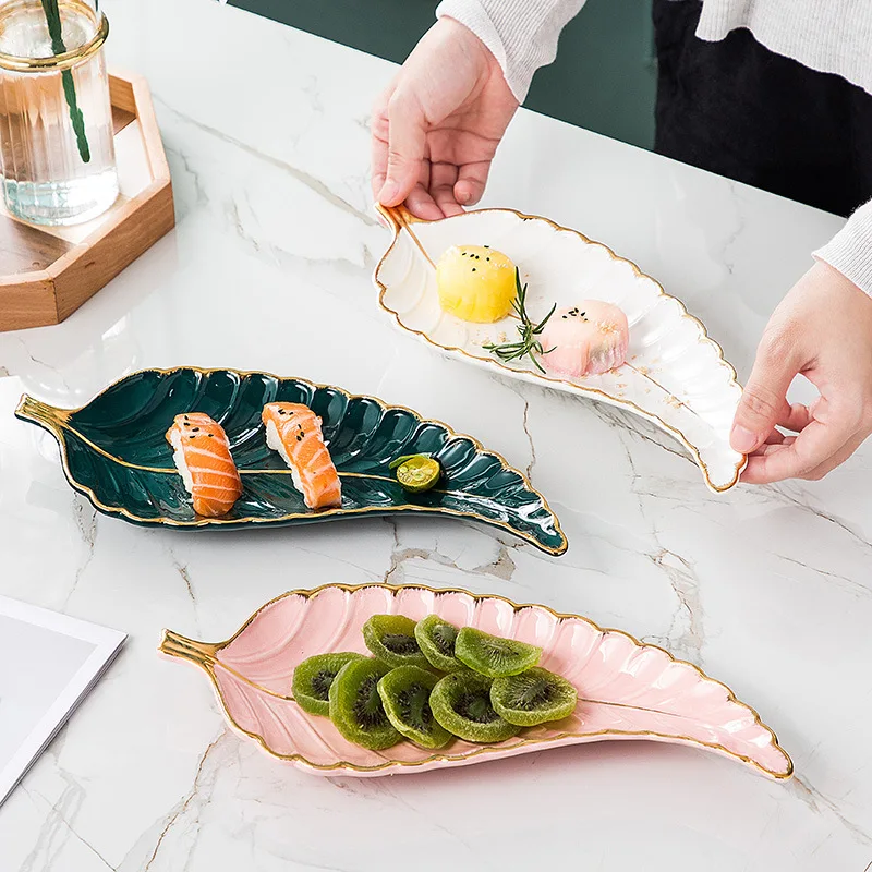 

New Nordic style ceramic plate with golden rim leaf shaped ornaments received sushi leaf fashion dim sum plate, White,pink ,black,green,gray