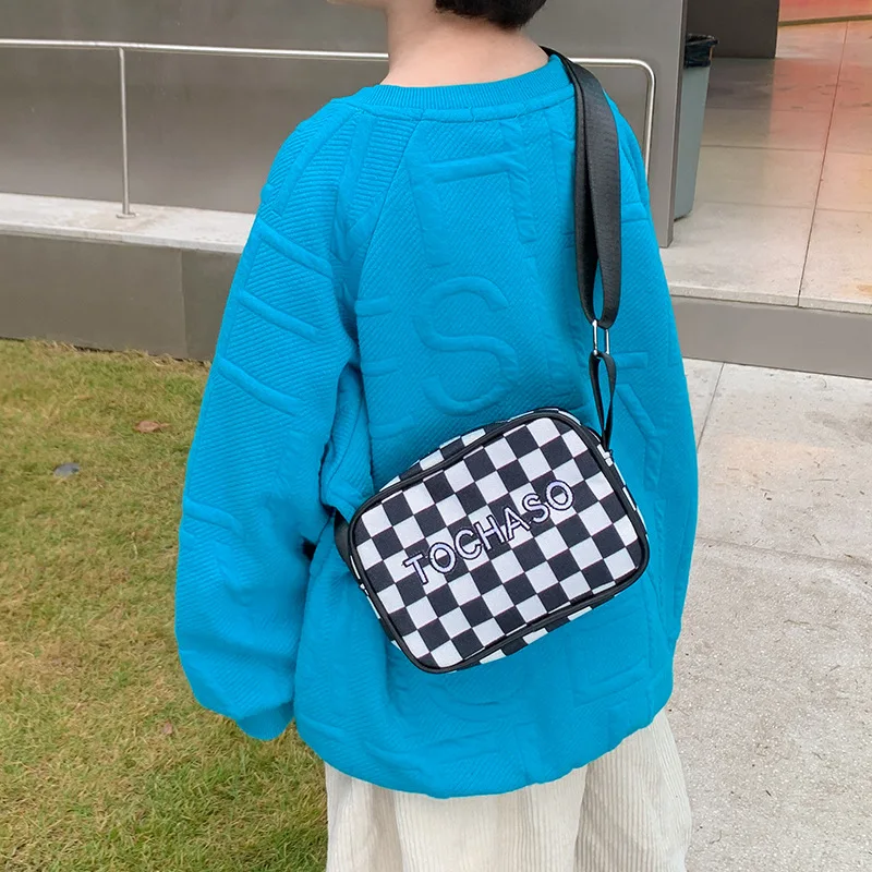 

new of children's messenger bag men's tide cool net red checkerboard girl fashion foreign style shoulder baby coin purse