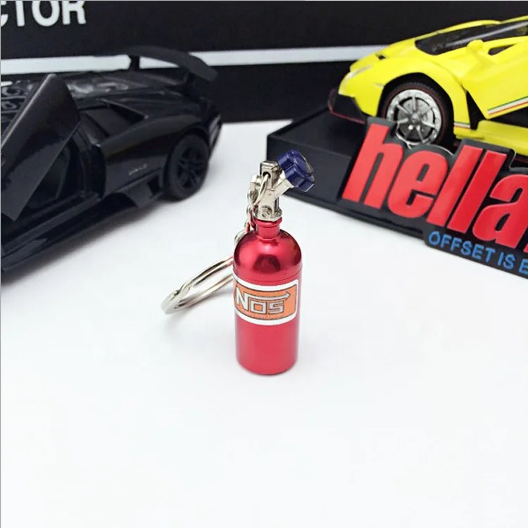 

Customized Motor turbine car part nitrogen cylinder perfume keychain