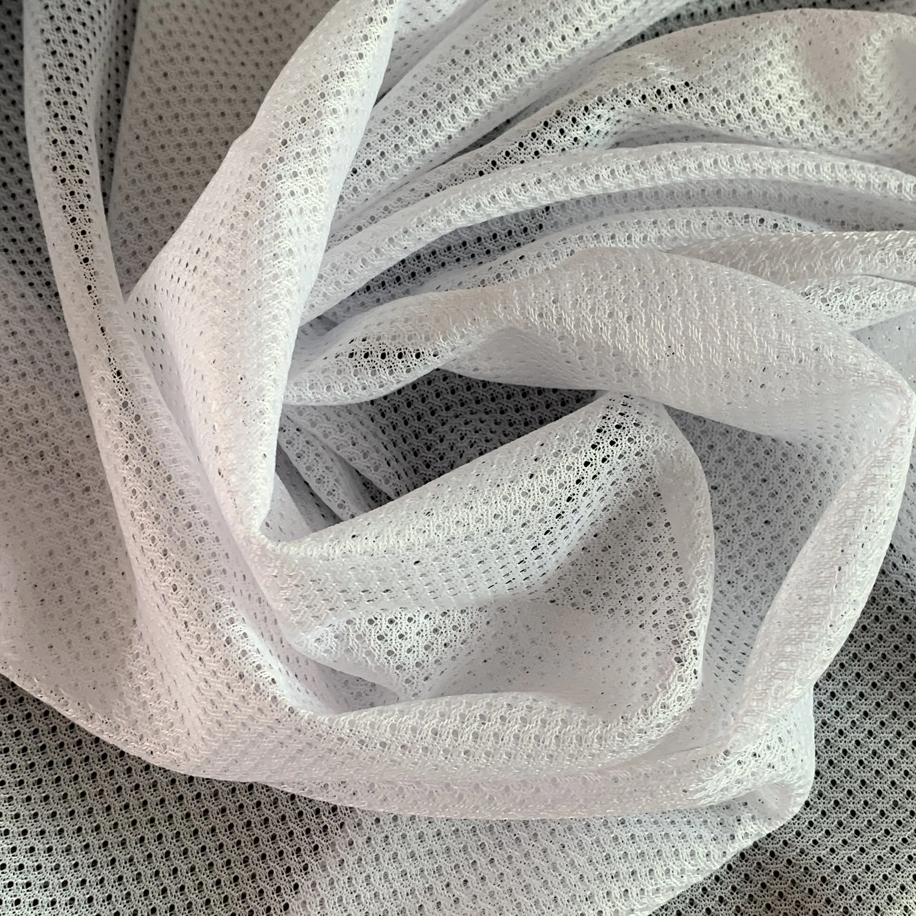 
Low elastic mesh fabric for garment lining 
