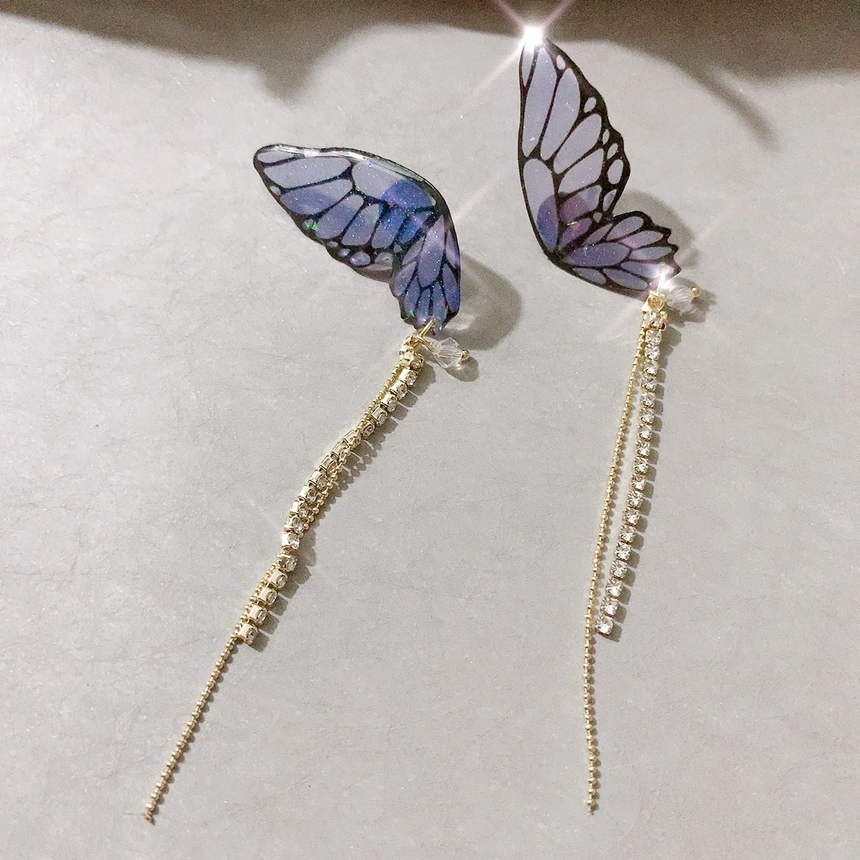 

2021 Hot Sale South Korean Light Luxury Sparkling Purple Butterfly Earrings Butterfly Tassel Earrings