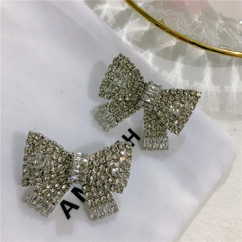 

elegant full crystal 2020 new design earrings flash luxury bowknot buttterfly bow stud earrings, Picture