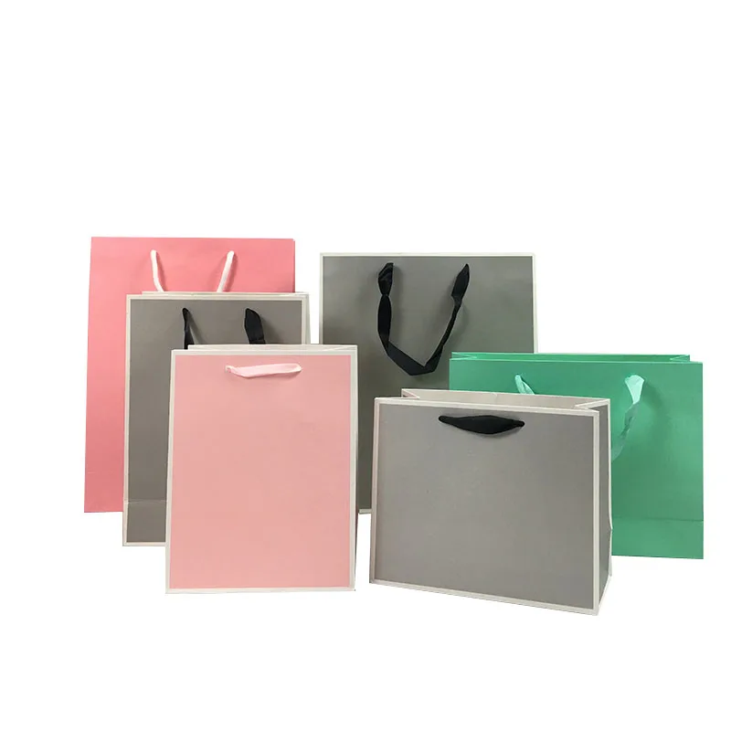 

Customized Brand printed Logo Luxury Boutique Shopping Paper Gift Bags Wholesale