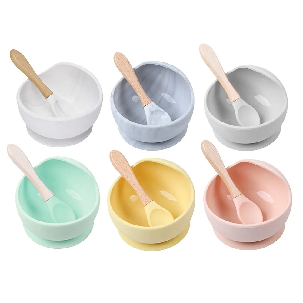 

Wholesale Custom Non-Slip Baby Silicone Feeding Bowl With Bamboo Spoon Food Grade, Blue/pink/yellow/green or customized