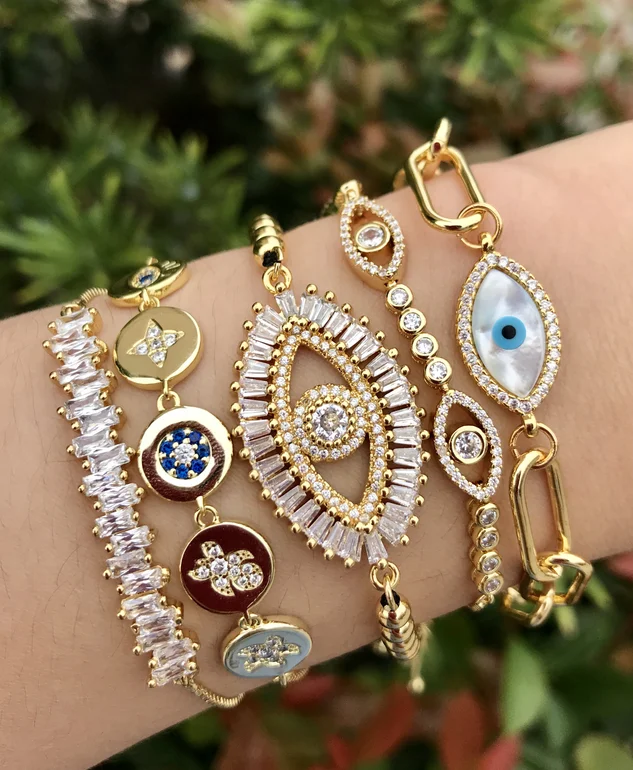 

Wholesale and retail temperament exquisite golden big eyes crystal copper micro diamond bracelet set, Picture shows