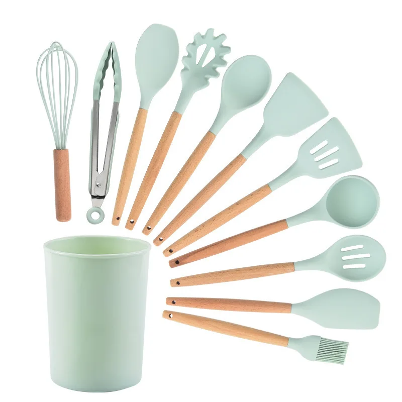

Amazon Hot sale Stock Food-grade Utensilios De Cocina 12 pieces wooden handle silicone kitchen cooking utensils set with holder, Sky blue pink gray or custom