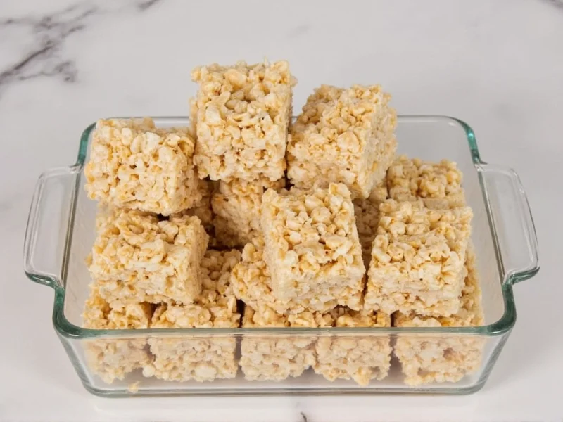 Rice crispy squares stored in glass container