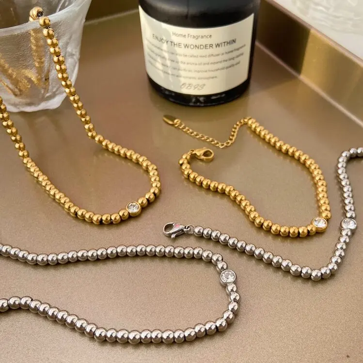 

Titanium steel gold-plated beaded jewelry set exquisite stainless steel gold-plated round bead zircon pendant bracelet necklace