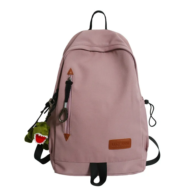 

2021 New Cute Preppy Style Simple Solid Color Couple Dinosaur Pendant Schoolbag Bag Pack Woman Camping Outdoor Backpack For Girl