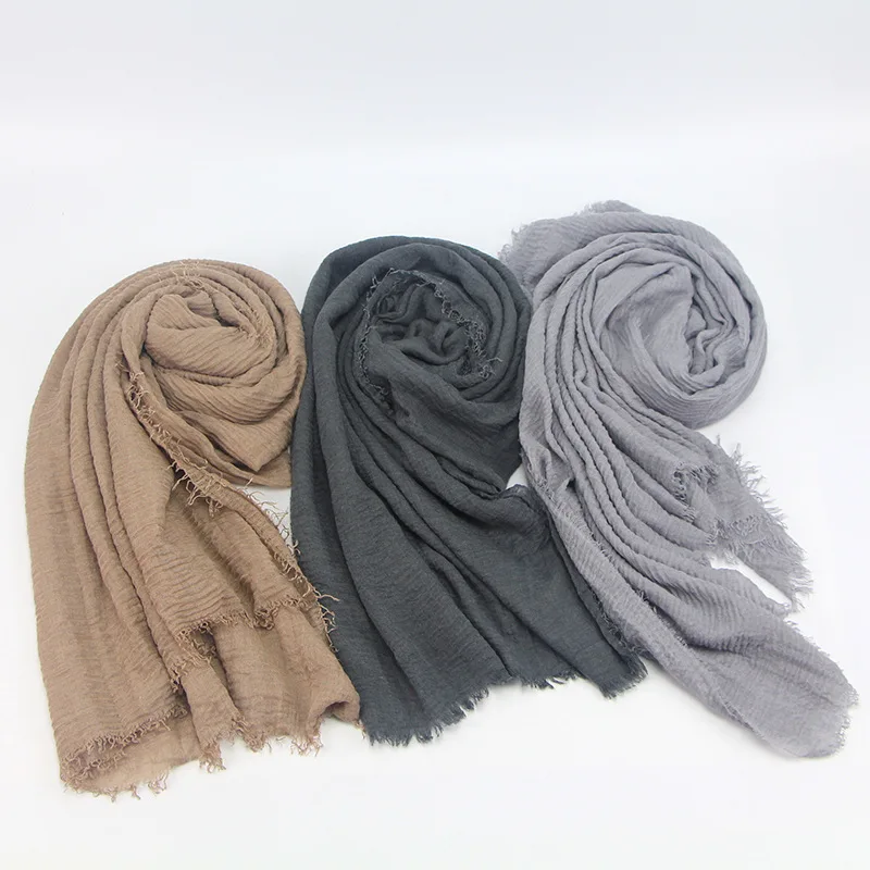 

Customizable Logo Hijabs Solid Color Cotton And Linen Women Headscarf New Pleated Monochrome Wool Shaved Scarf Hijabs