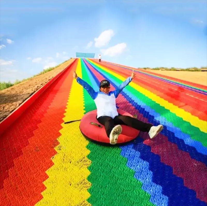 
Funny Outdoor Playground Amusement Games Children Grass Sliding Way Rainbow Dry Snow Slide For Sale 