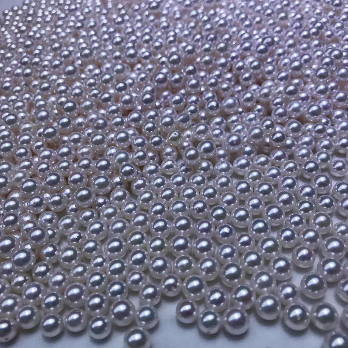 

wholesales price,AKOYA 7-7.5 mm high quality AAA perfect round nature loose pearl with half drilled
