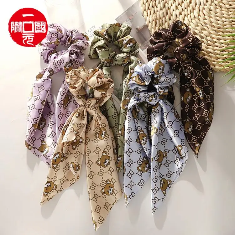 

One dollar South Korea's new bowknot hair rope head rope hair ring personalized cloth leather sleeve hair rubber band headdress