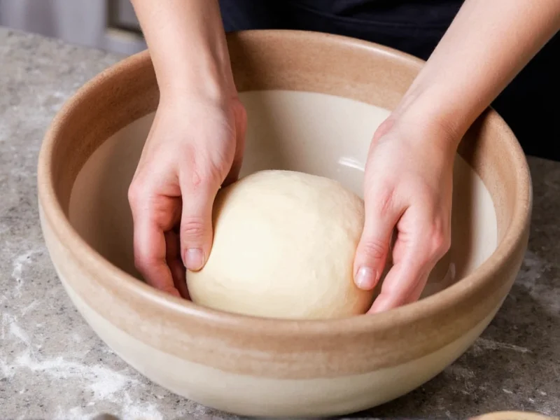 Hands shaping no-knead bread dough in ceramic bowl