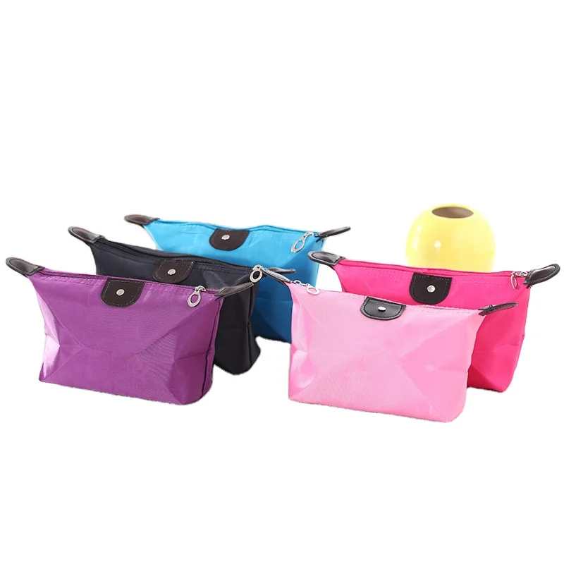 

Jiaozi-shaped handbag wash cute female portable cosmetic storage bag Yuanbao travel cosmetic bag