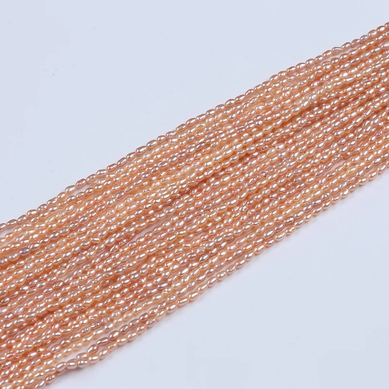 

Wholesale tiny pink  rice shape loose freshwater pearl beads strings