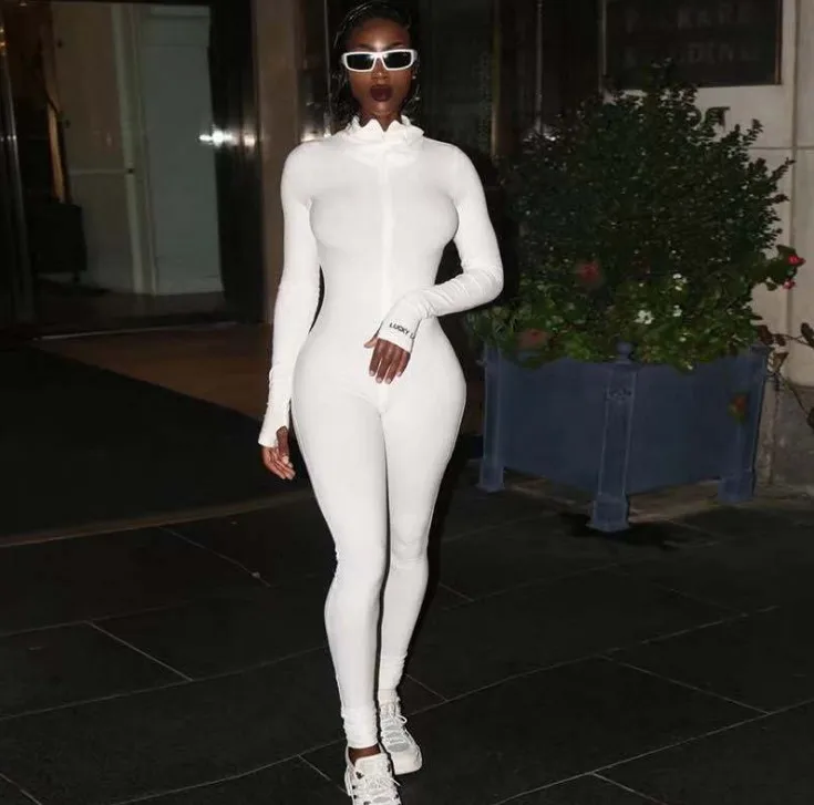 

2021 Wholesale new arrival sexy lucky label women white one piece women jumpsuits, White,nude,pink,grey