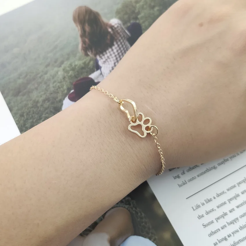 

00009-22 Hollow Pet Paw Footprint gold plated metal bracelet