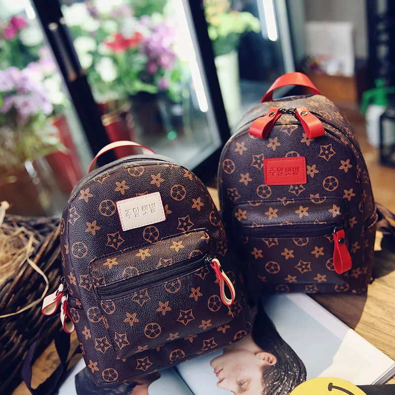 

Korean version of the classic flower luxury backpack fashion outdoor student travel waterproof mini cross bag