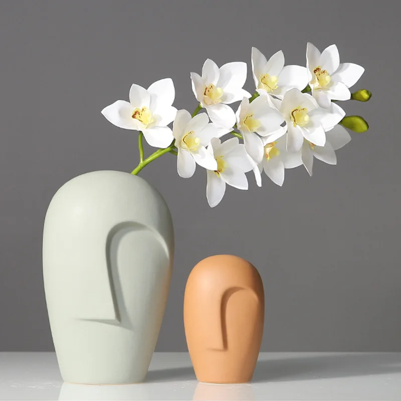 

Nordic New creative Nordic modern simple wind face ceramic vase sample room club exhibition hall personality vase, Picture